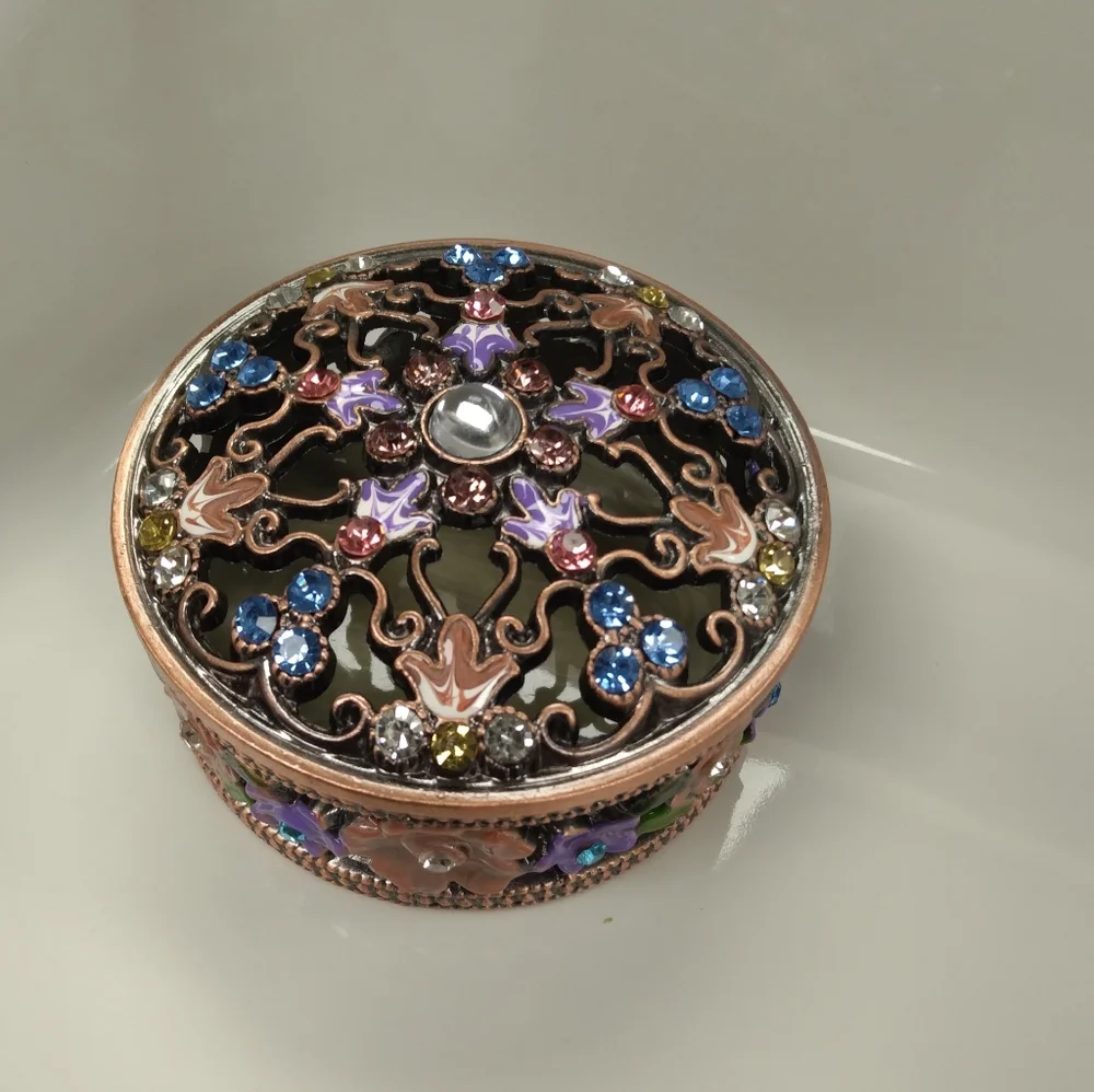 Elegant Bronze Jewelry Trinket with Purple Details
